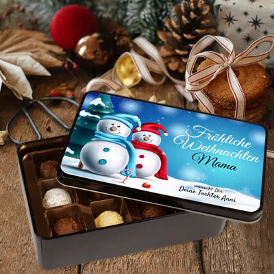 Geschenkdose mit Pralinen personalisiert mit Namen und Wunschtext „Fröhliche Weihnachten“ / Schneemann