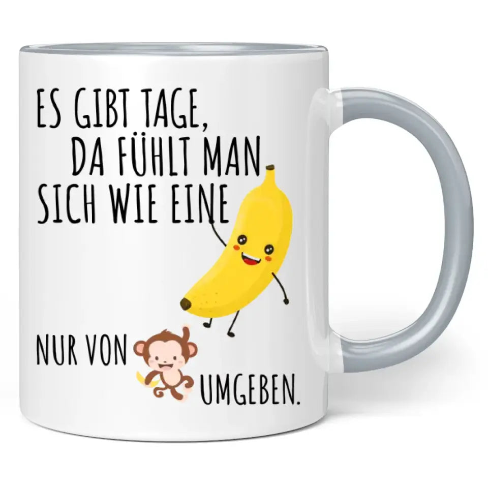 Tasse "Es gibt Tage, da fühlt man sich wie eine Banane, nur von Affen umgeben."