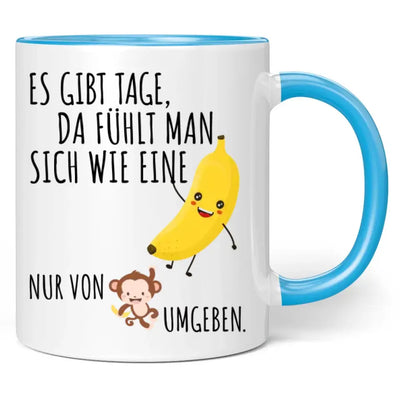 Tasse "Es gibt Tage, da fühlt man sich wie eine Banane, nur von Affen umgeben."