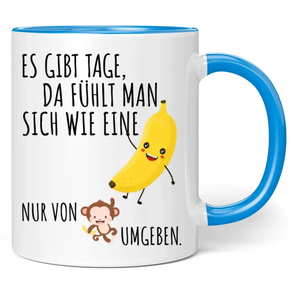 Tasse "Es gibt Tage, da fühlt man sich wie eine Banane, nur von Affen umgeben."